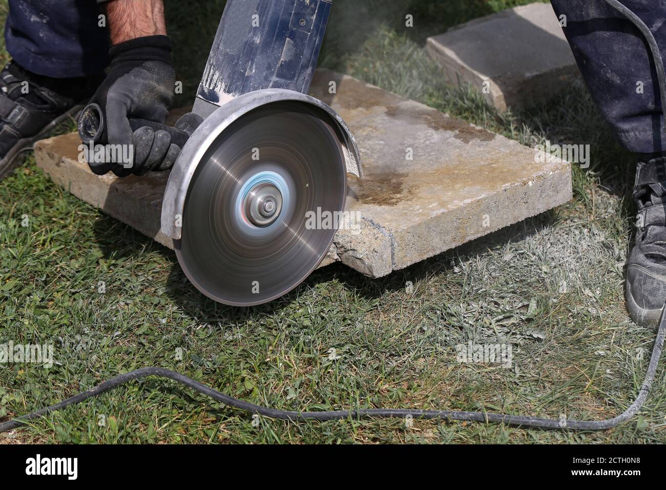 Angle grinder cutting bricks at a construction site Stock Photo Alamy