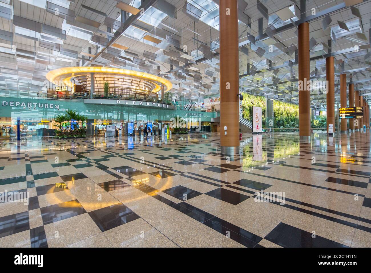 Changi Airport Departure area is lifeless due to the global pandemic outbreak that disrupted the aviation business and travellers around the world. Stock Photo
