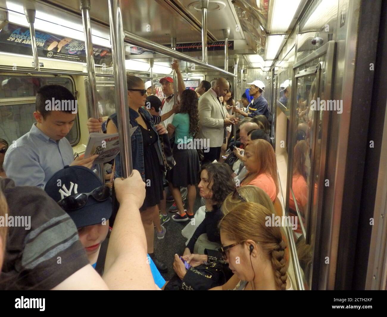 Busy train carriage, NYC subway system, New York City, USA Stock Photo