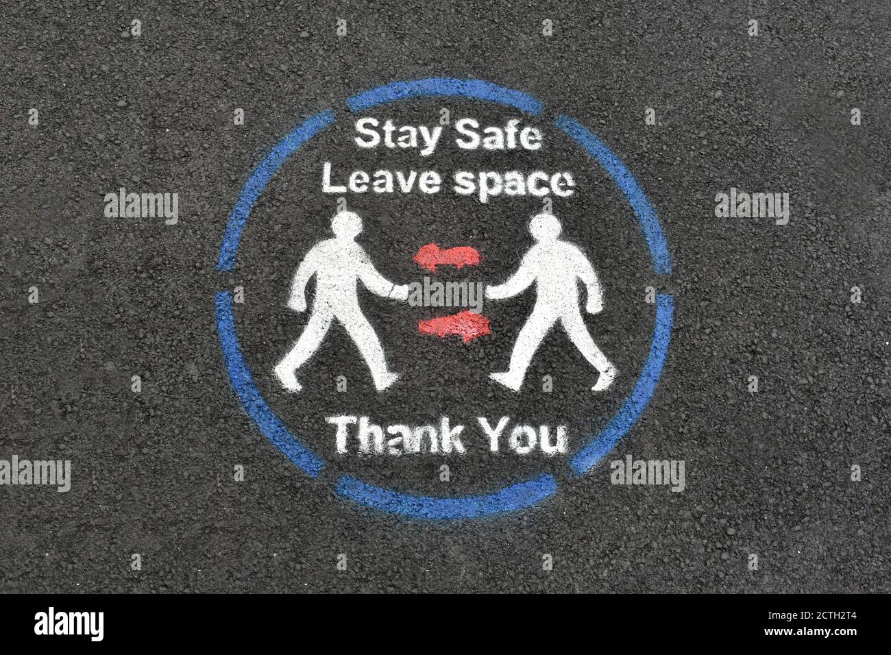 Leave Suitable Distance Sign close up of people social distancing sign on tarmac background to stay ...