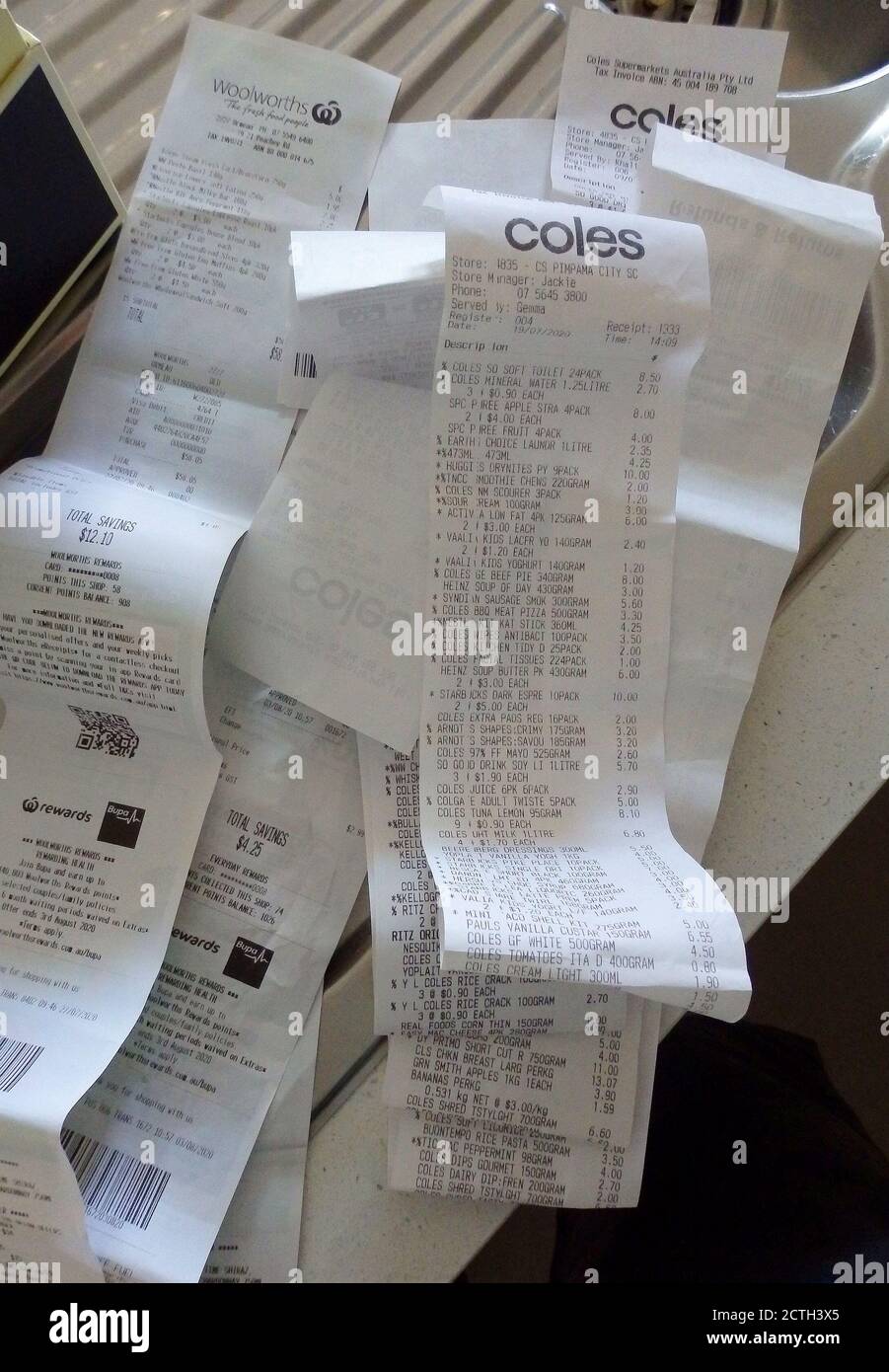 Tax time, sorting of supermarket receipts for the end of the Financial Year, Australia Stock Tax time, sorting of supermarket receipts for the end of the Financial Year, Australia Stock