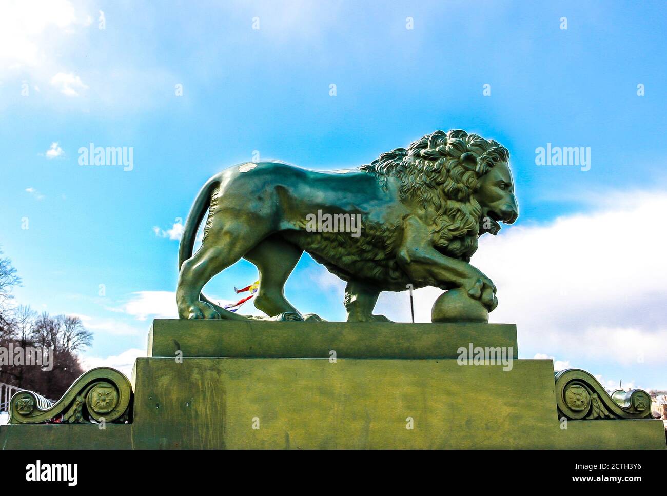 The bronze lion at Dvortsovaya pier of the Admiralty Embankment. St. Petersburg, Russia Stock Photo