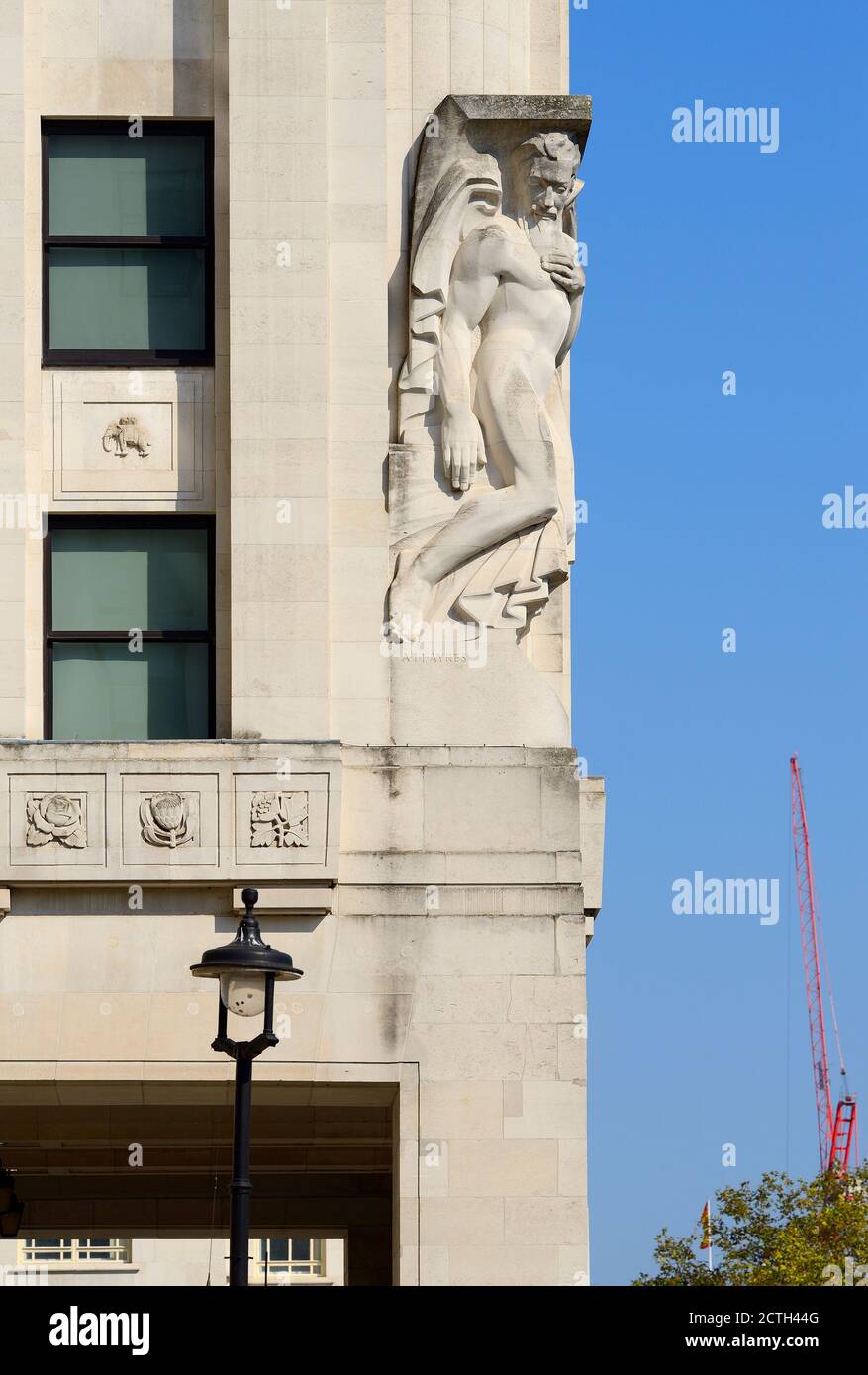 London, England, UK. New Adelphi Building, Adam Street / Victoria Embankment. Art Deco (1938) Portland stone. Allegorical statue 'Contemplation' (by A Stock Photo