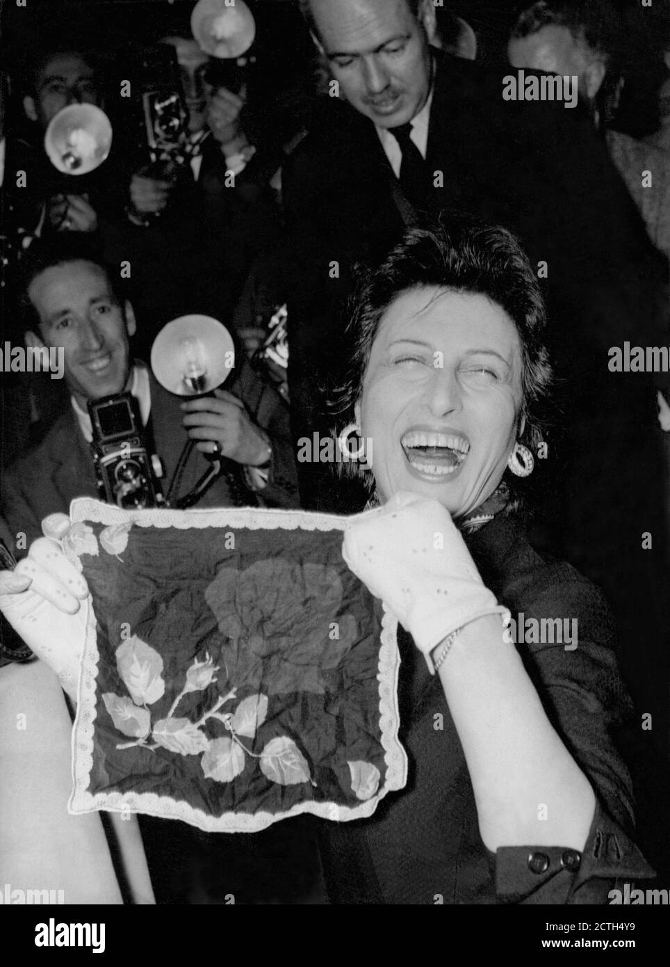 The actress Anna Magnani, who won the Oscar for best actress for the film  "The Rose Tattoo" was honored with a cloth embroidered with the pattern of  the Rose Tattoo, Rome -