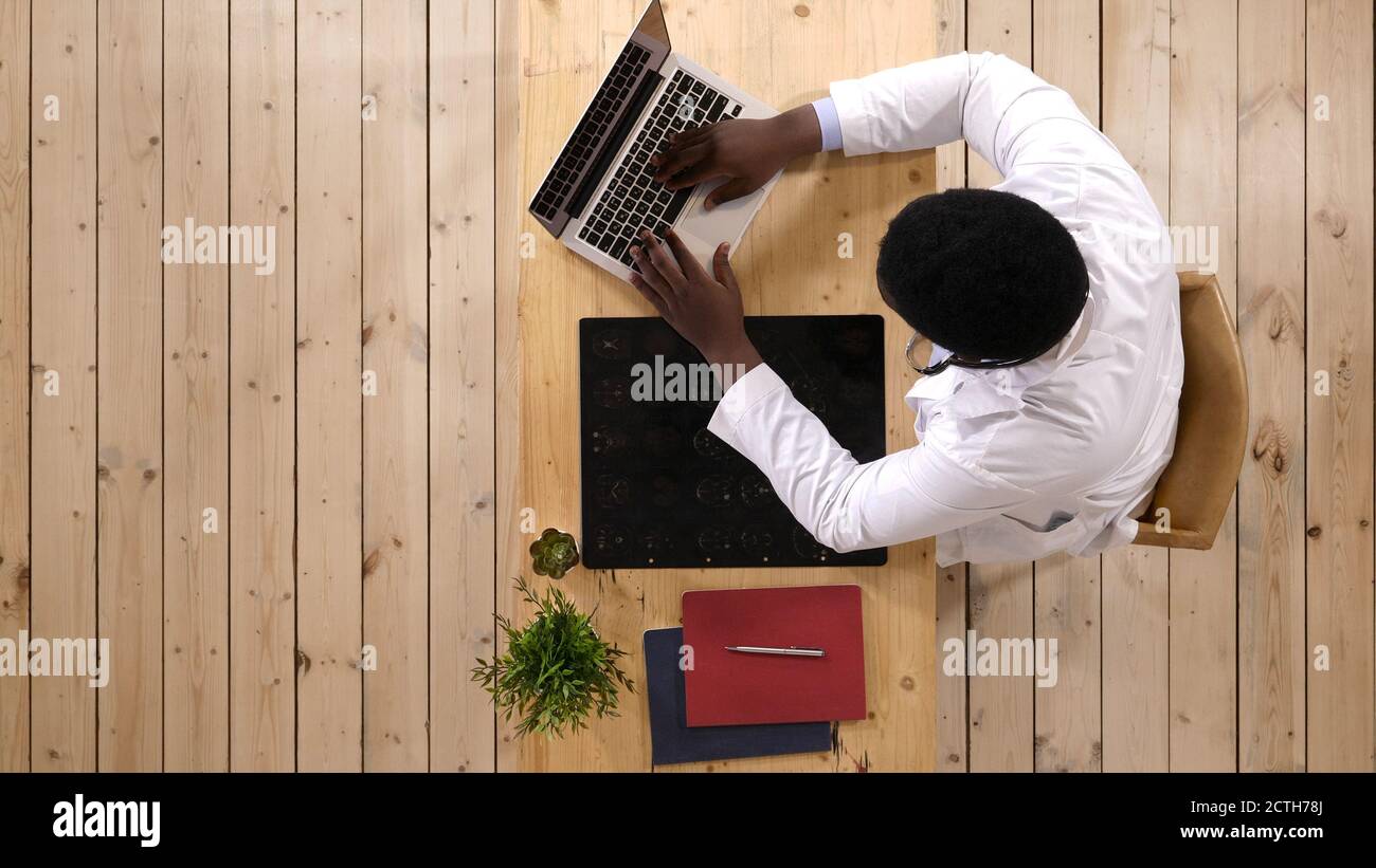 Afro american intellectual man healthcare personnel with white l Stock Photo