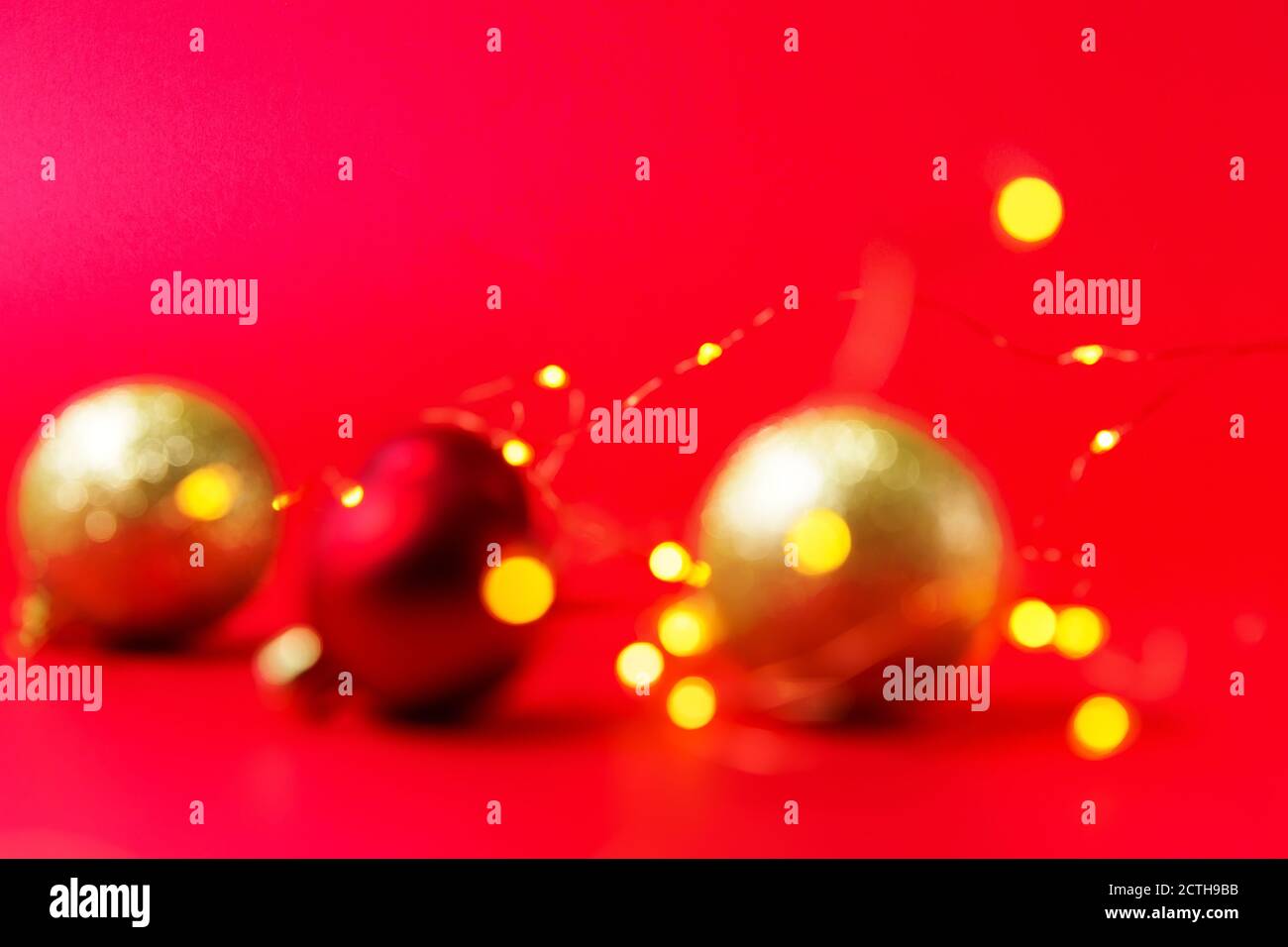 Christmas decorations on a red background with soft focus. Stock Photo
