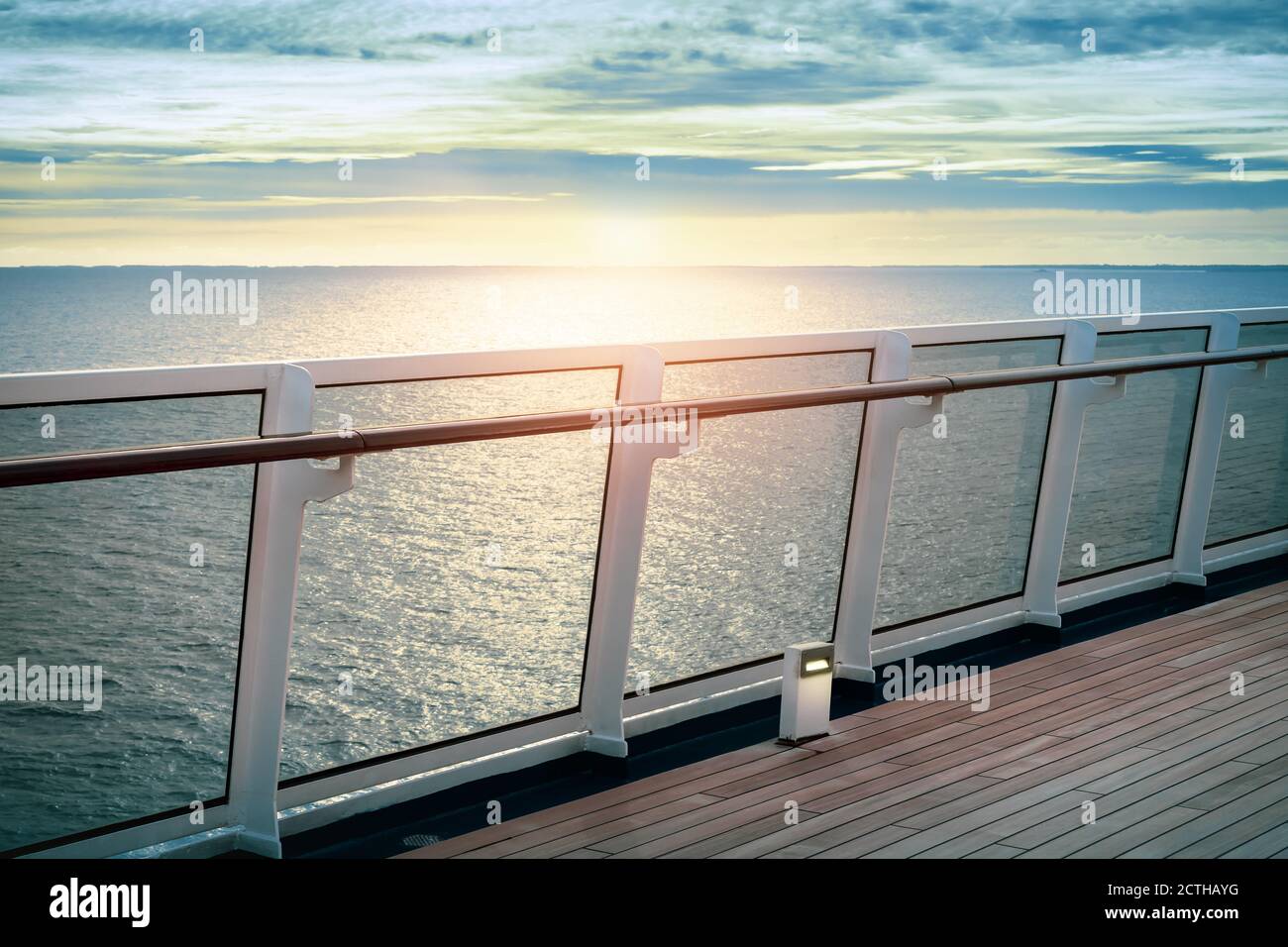 Cruise ship railing at sunset. Stock Photo