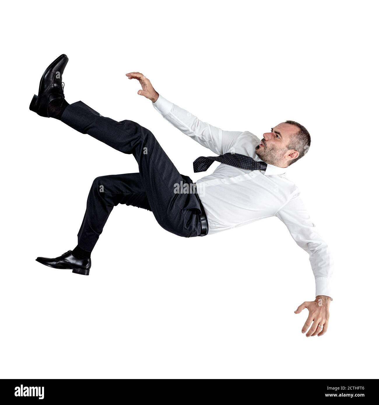 businessman falling down isolated on white. Stock Photo