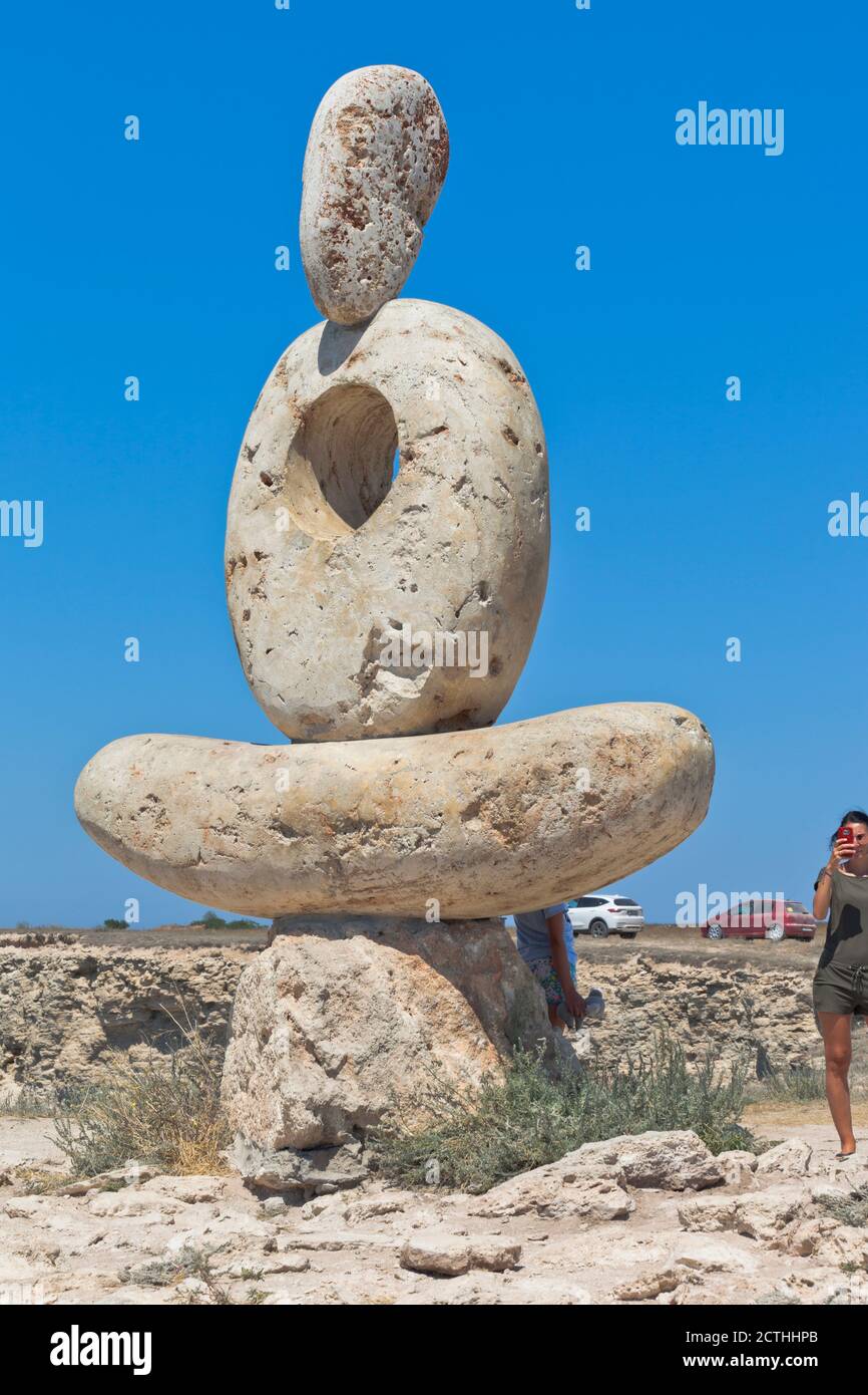 Chernomorsky district, Crimea, Russia - July 21, 2020: Sculpture The Thinker on the White Rock of Cape Tarkhankut, Crimea Stock Photo