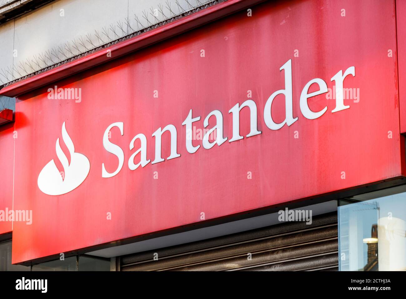 Sign above a branch of Santander bank in Camden High Street, London, UK ...