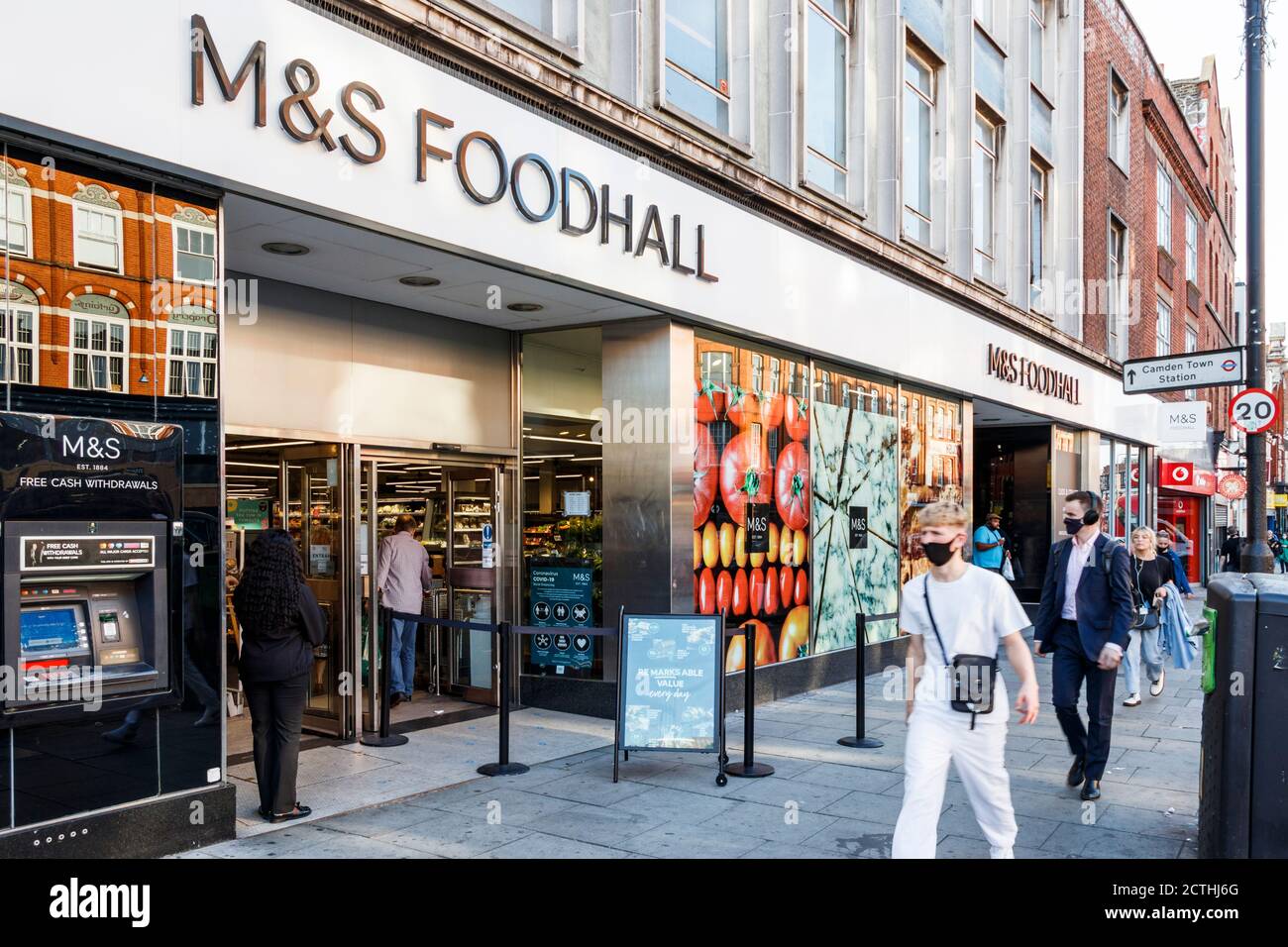 M&S Foodhall on Camden High Street on an unusually warm late-September evening, London, UK Stock Photo