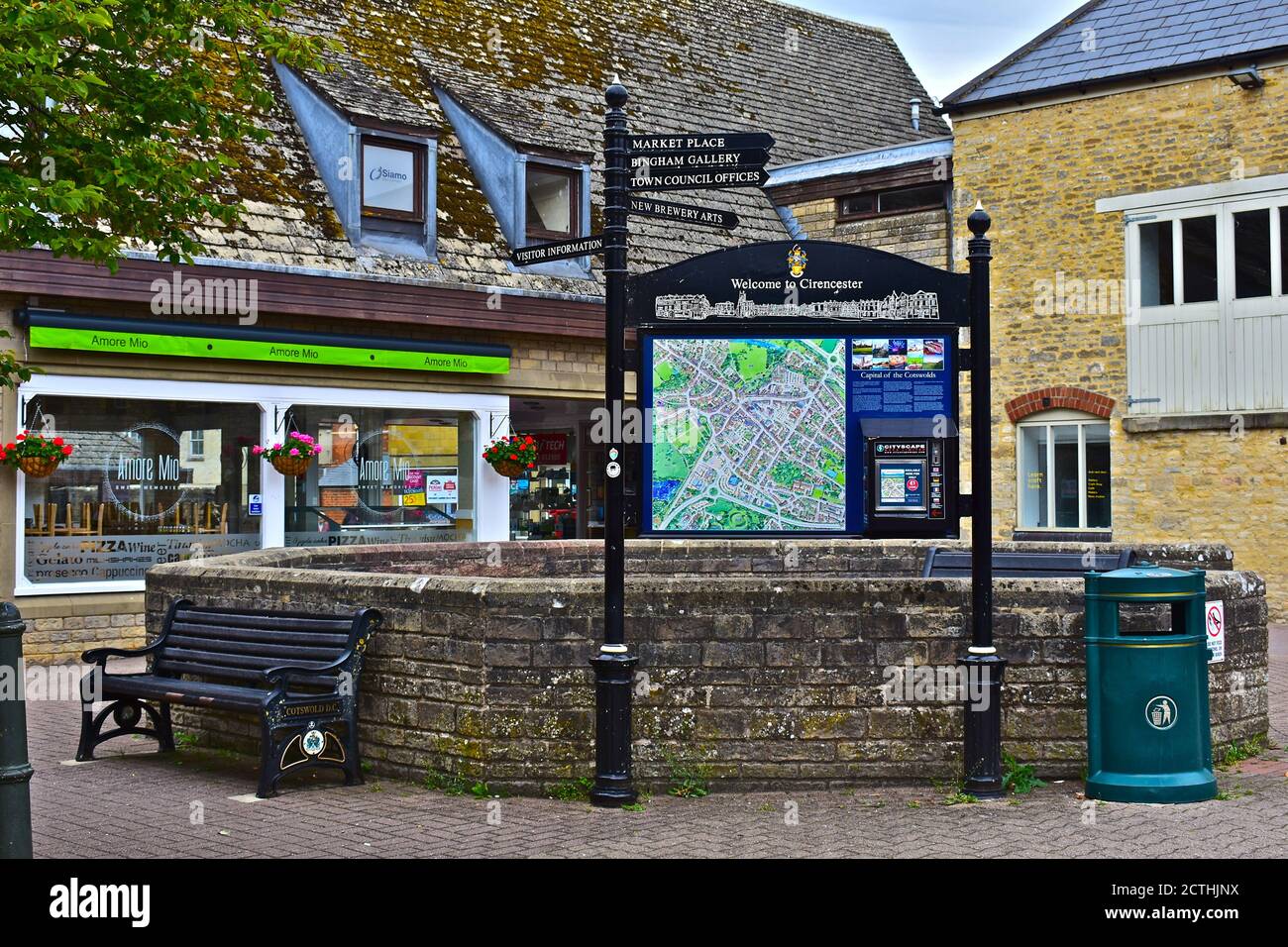 Tourist information sign showing local places of interest, and bench