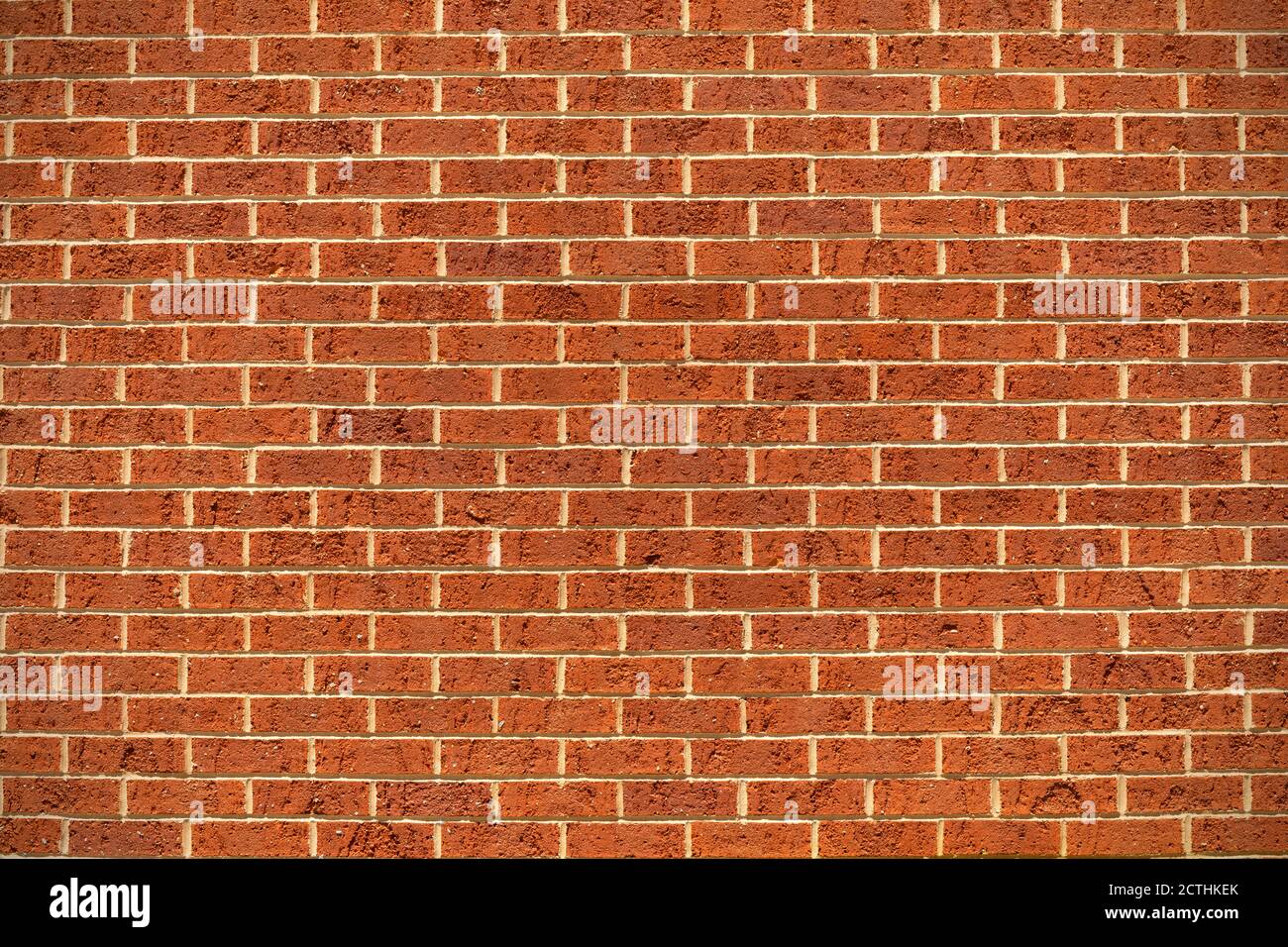 Straight on view orange brick background, creative urban pattern copy space, horizontal aspect Stock Photo