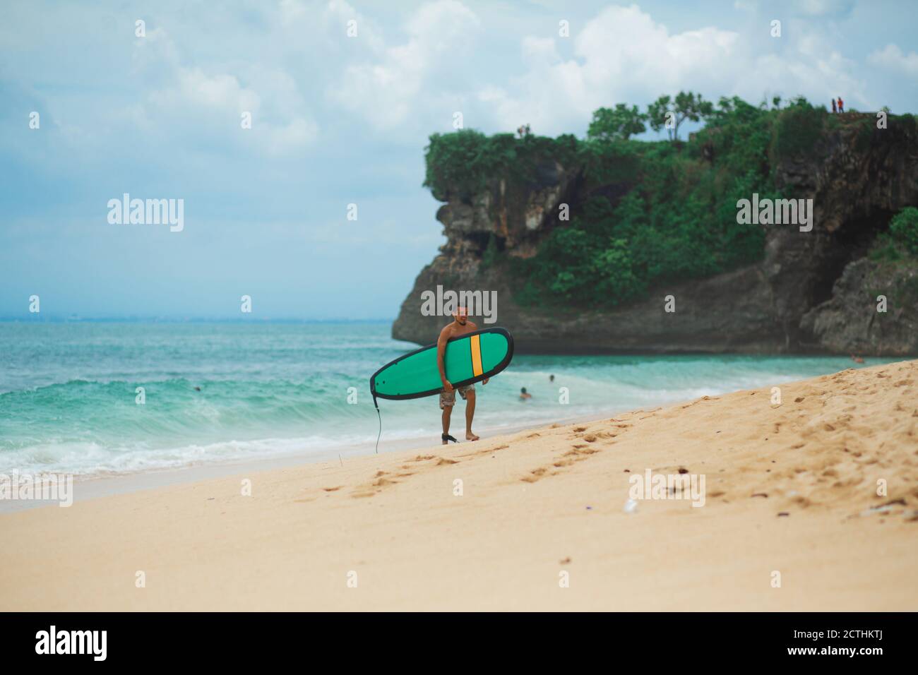 Surfer. Surfing Man With Surfboard Walking On Sandy tropical Beach ...