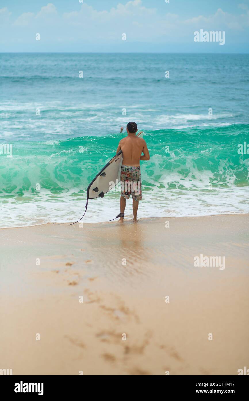 Surfer. Surfing Man With Surfboard Walking On Sandy tropical Beach ...