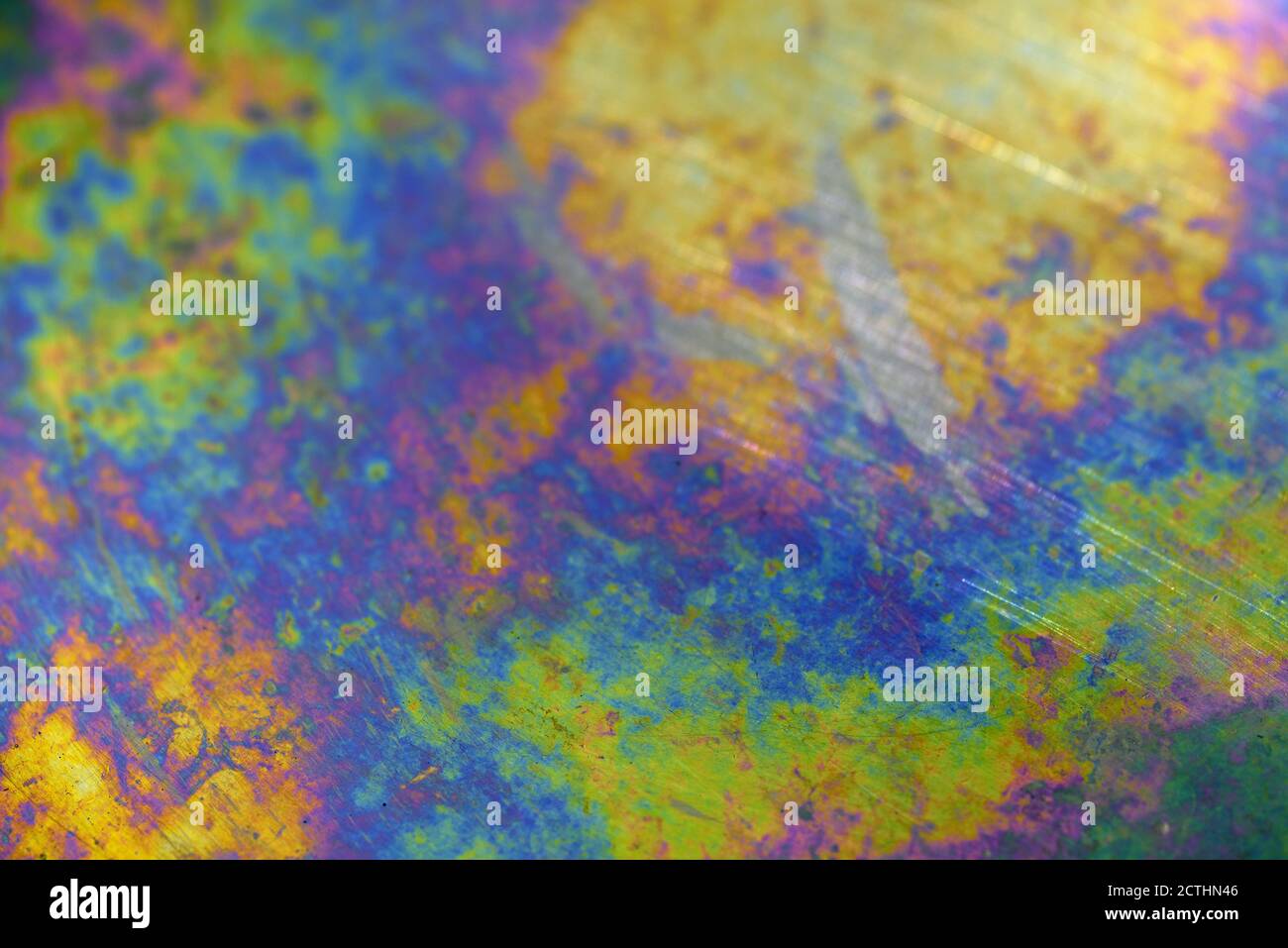 Iridescent surface of a metallic plate (background) Stock Photo