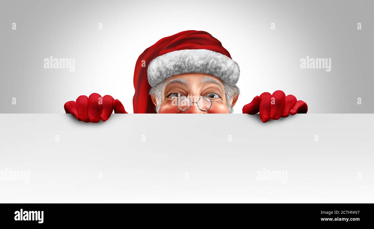 Santa Claus holding a banner with copy space as a Christmas holiday ...