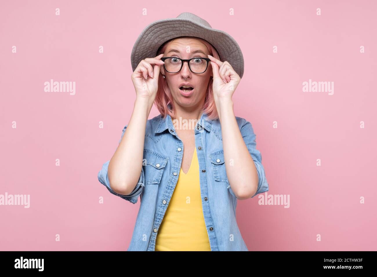 Young women wearing funny glasses hi-res stock photography and images ...