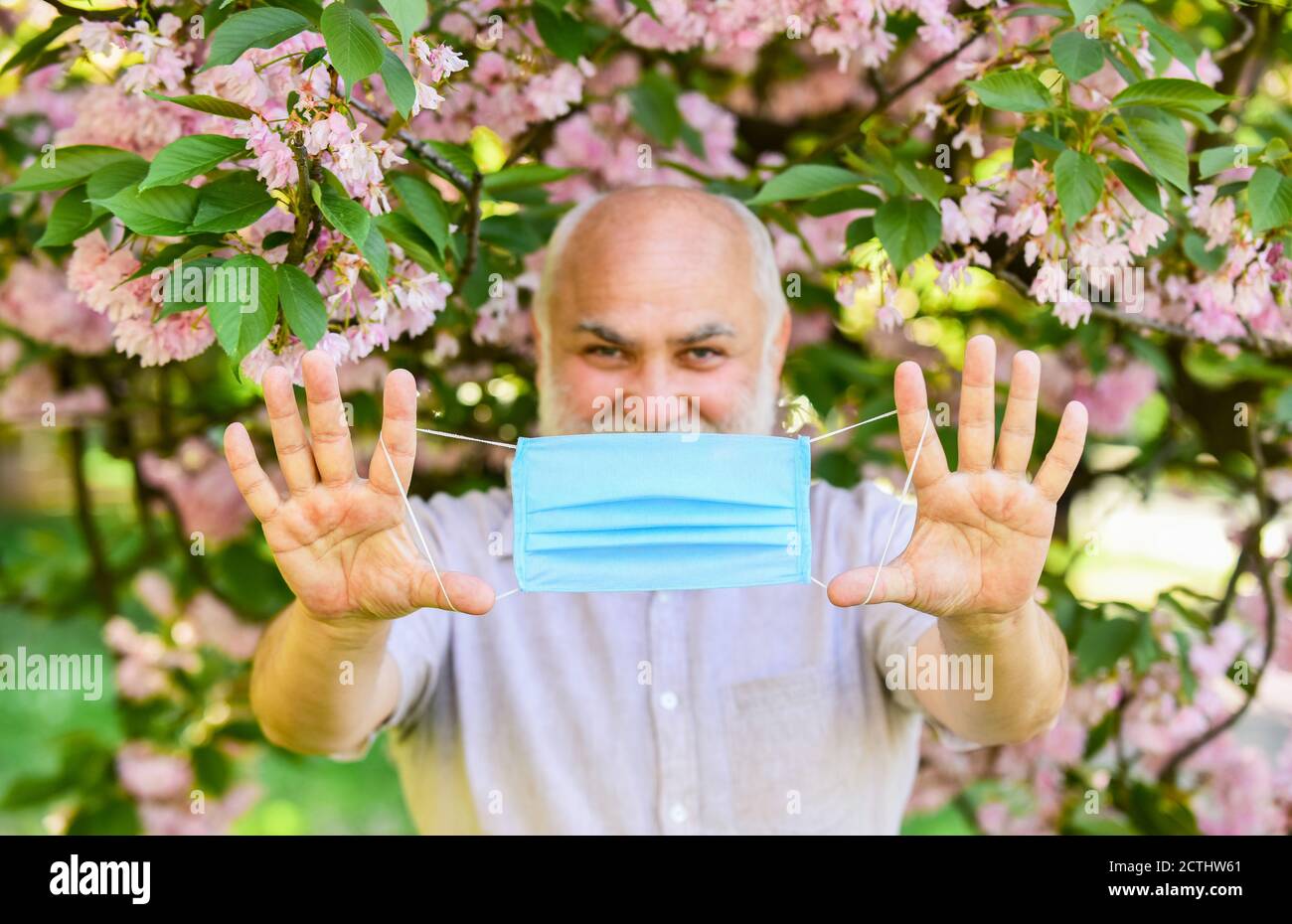 Senior man face mask. Respiratory mask. Pollen allergen. Man and