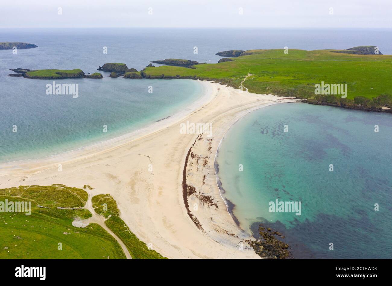 View of St Ninian's Isle and beach , called a Tombolo or Ayre, at Bigton, Dunrossness, Shetland, Scotland, UK Stock Photo