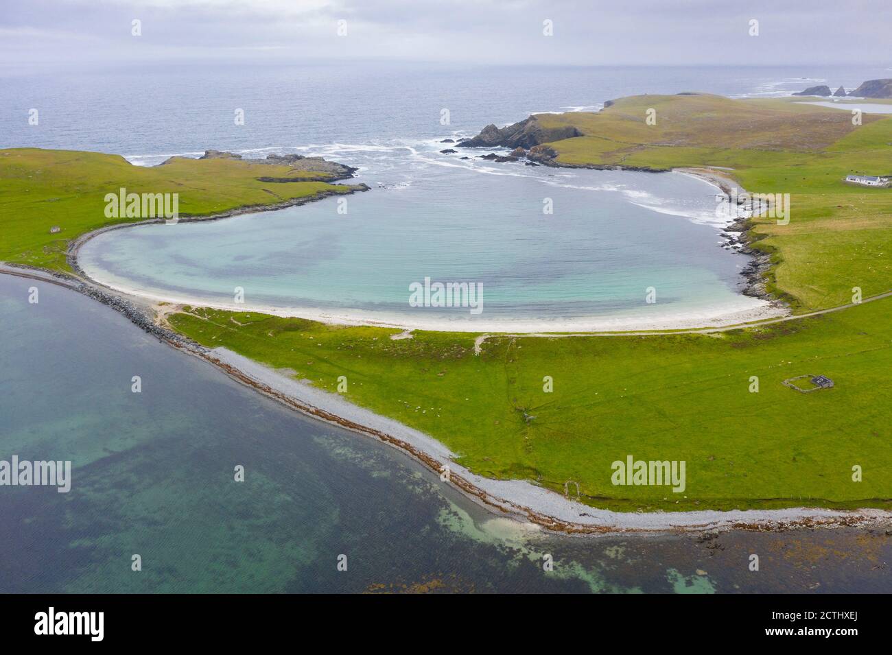 View of beach on Ayre or Tombolo at Banna Minn at Papil on West Burra, Shetland, Scotland Uk Stock Photo