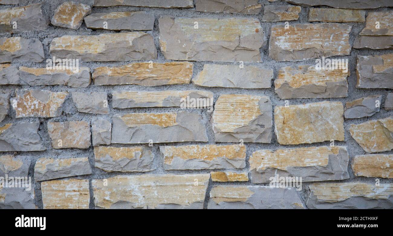 The stone texture background includes free space to copy products or ...