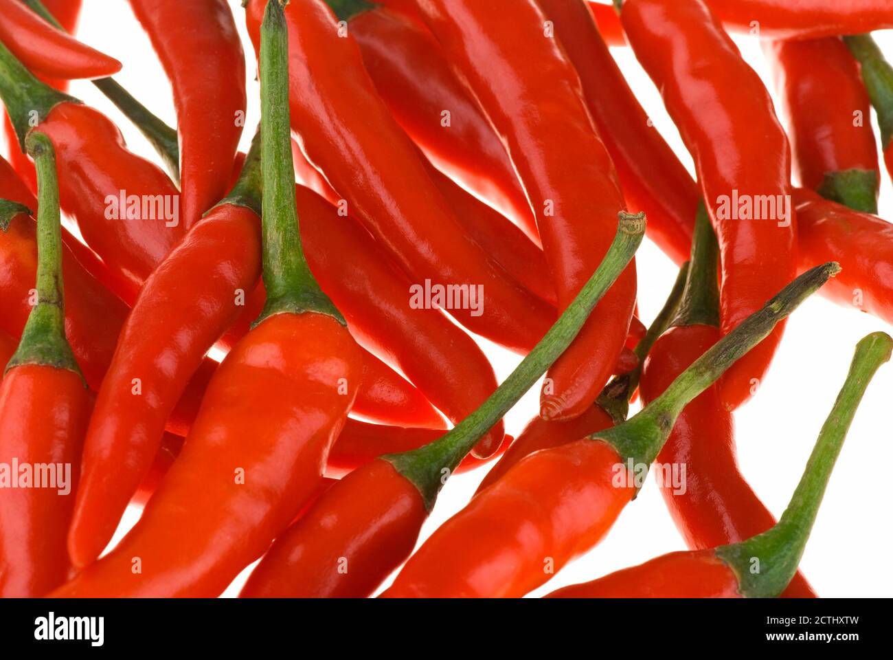 Red hot chili peppers isolated on the white background Stock Photo - Alamy