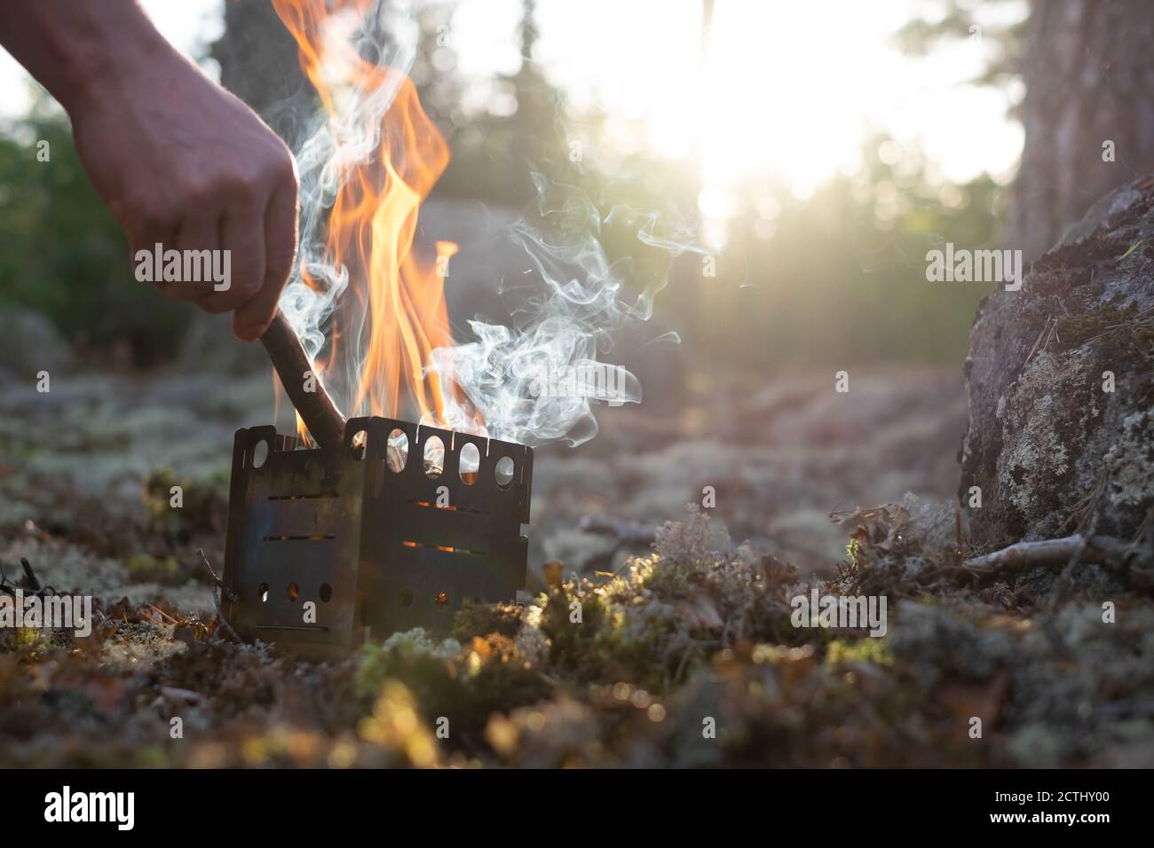 Fire in forest camp. Special small splinter tourist campfire Stock ...