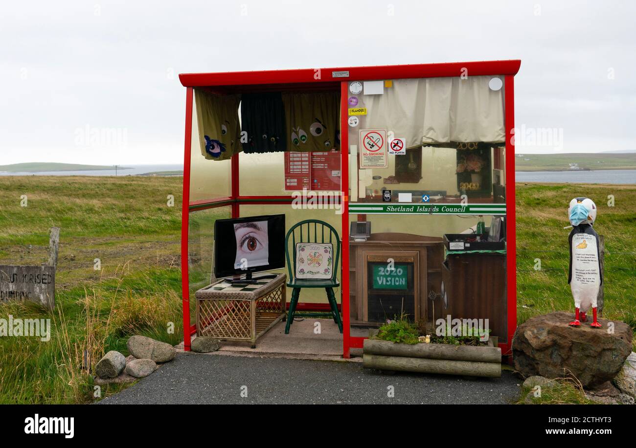 The UK's most northerly bus stop shelter with decoration inside at Haroldswick on Unst, Shetland , Scotland, UK Stock Photo