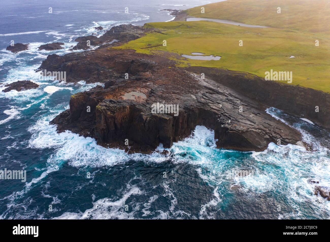 Dramatic pyroclastic ash rock formation at Grind o' Da Navir, on coast at Eshaness, Northmavine, north mainland, Shetland Islands, Scotland, UK Stock Photo