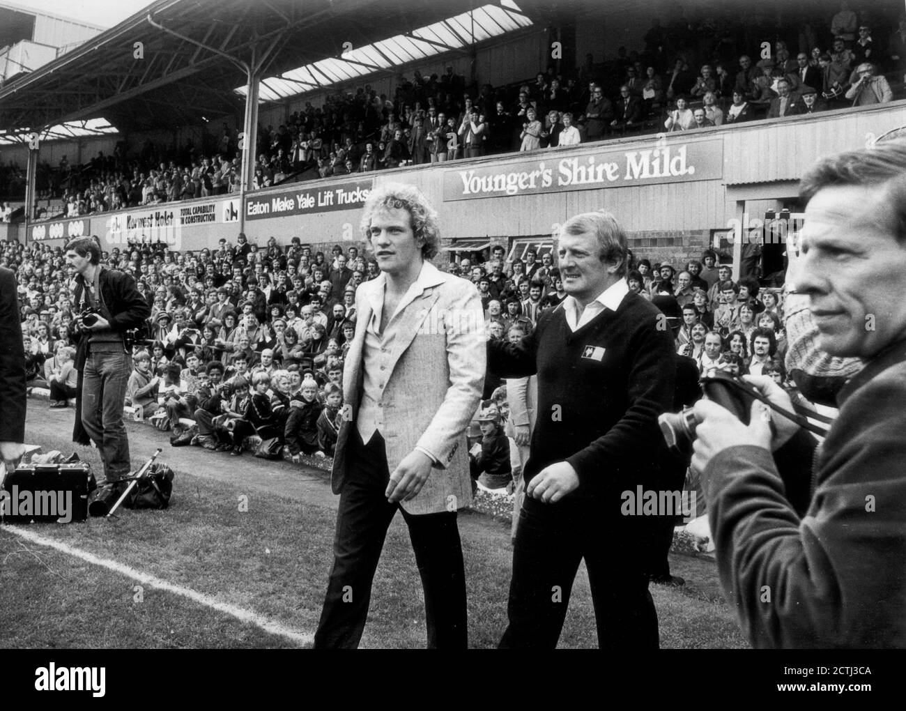 Wolverhampton Wanderers manager John Barnwell introduces Wolves new signing Andy Gray to the Molineux crowd September 22nd 1979 Stock Photo