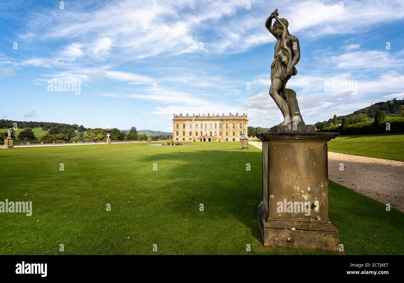 Marble statues on the lawn in front of the southern face of Chatsworth House in Derbyshire, UK on 13 September 2020 Stock Photo