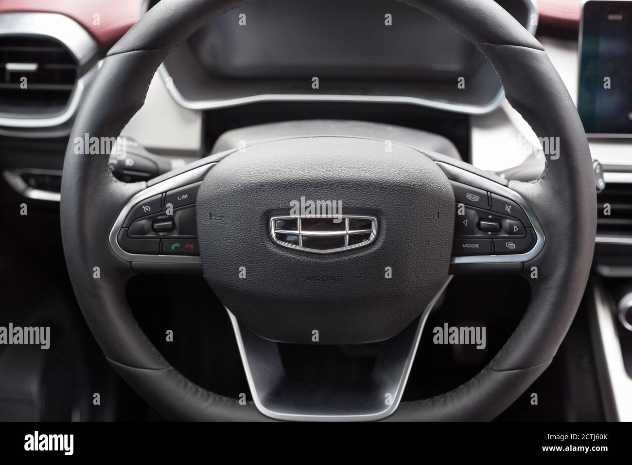 Russia, Izhevsk - August 14, 2020: Geely showroom. Steering wheel of new CoolRay car with leather cover. Car manufacturer from China Stock Photo