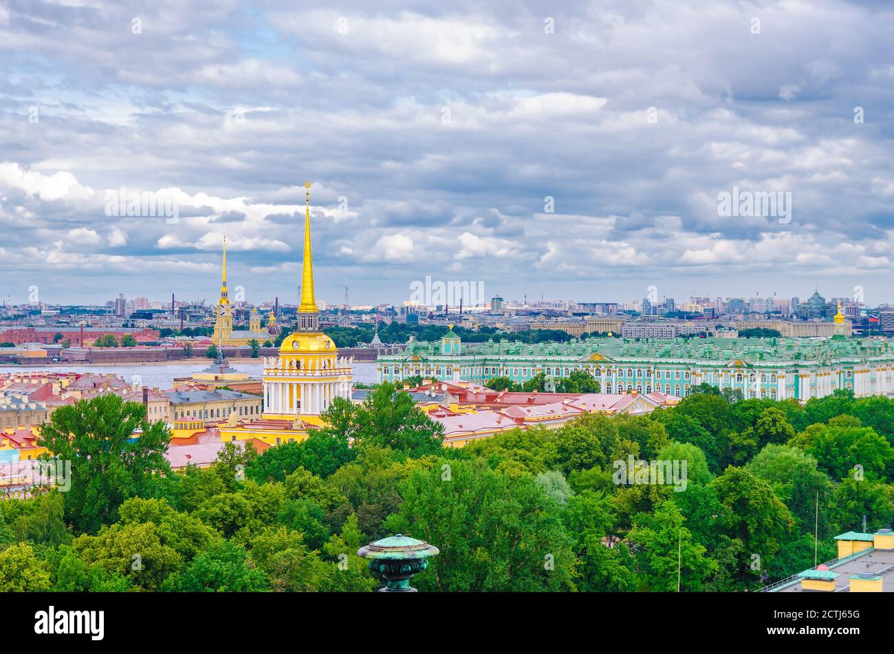 Top aerial panoramic view of Saint Petersburg Leningrad city with Alexander Garden, State Hermitage Museum, Winter Palace, Neva river, golden spire of Admiralty building, blue dramatic sky, Russia Stock Photo