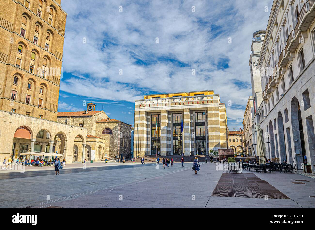 Brescia, Italy, September 11, 2019: Post Office building, Torrione INA or INA Tower skyscraper on Piazza della Vittoria Victory Square with Art Deco Rationalism style building, city historical centre Stock Photo