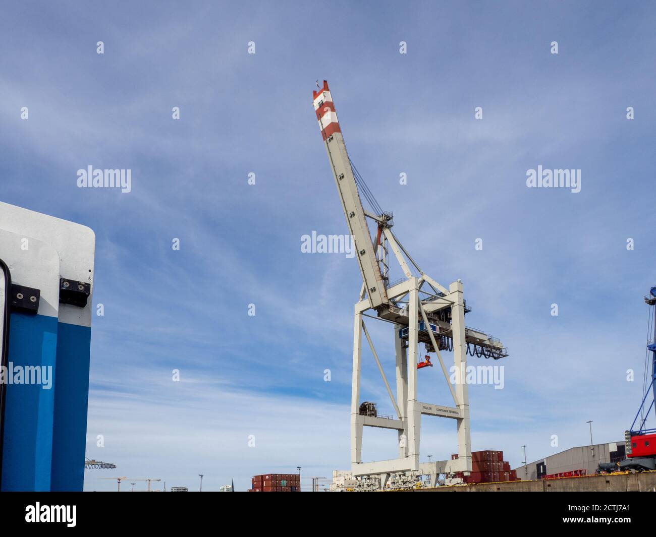 a crane for loading and unloading container ships is in the port Stock ...