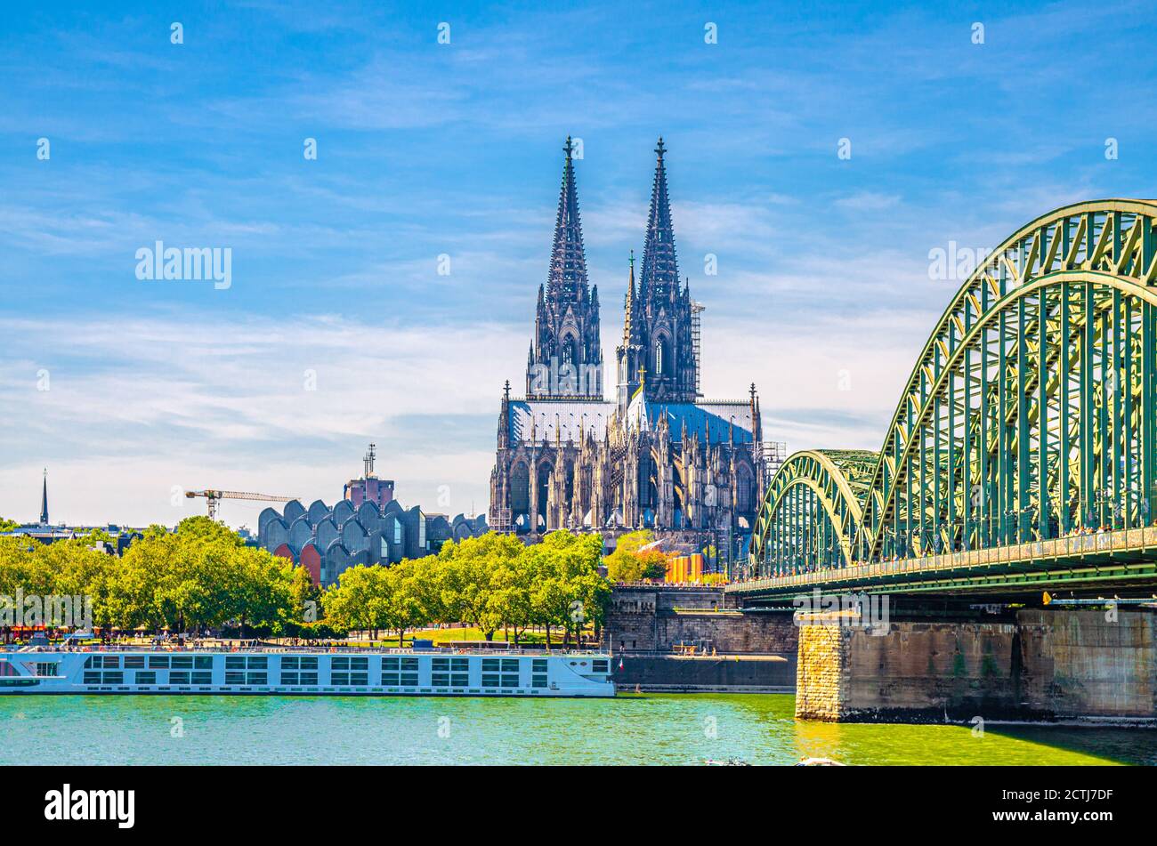 Cologne cityscape of historical city centre with Cologne Cathedral Roman Catholic Church of Saint Peter gothic style building, Hohenzollern Bridge across Rhine river, North Rhine-Westphalia, Germany Stock Photo