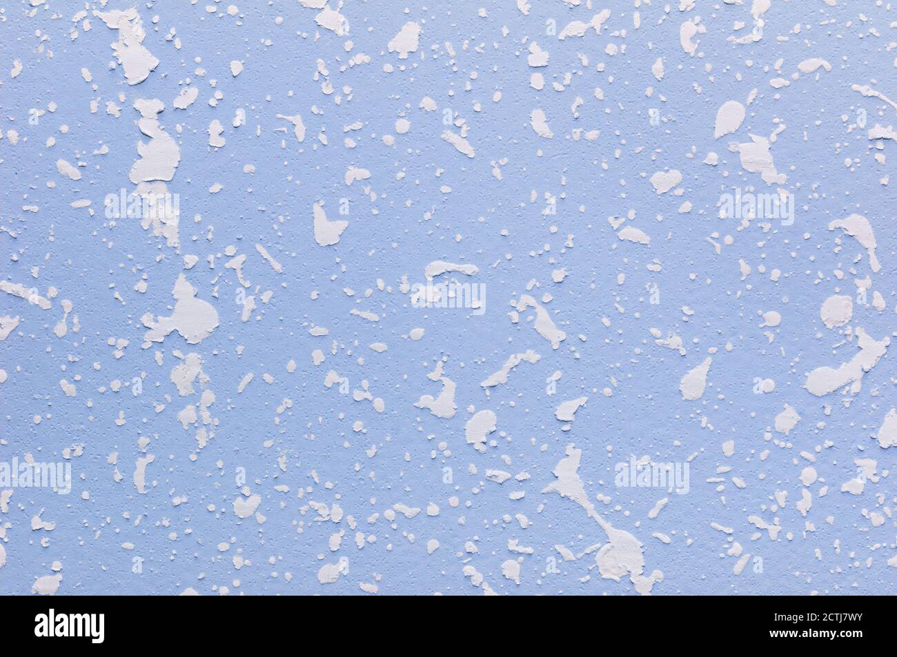 Decorative plaster. Finishing off painted walls by particle white plaster. Textured background Stock Photo
