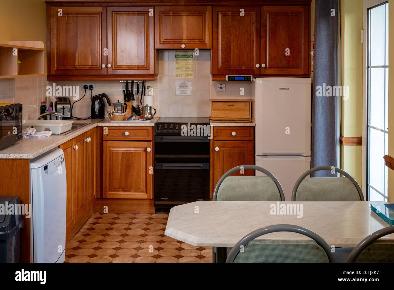 Typical kitchen interior in self catering guest house and bed and breakfast apartment in Ireland Europe Stock Photo