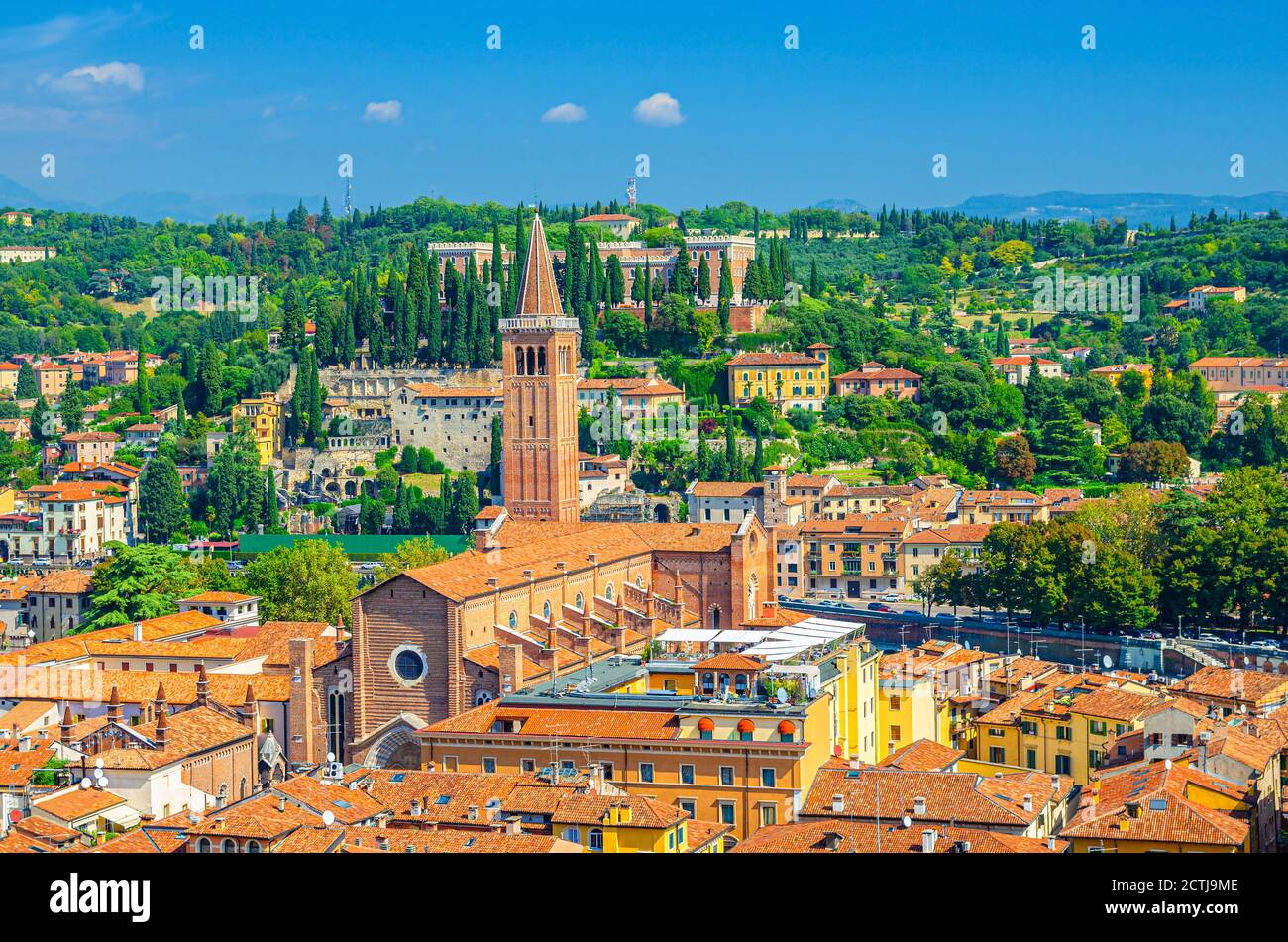 Aerial view of Basilica di Santa Anastasia catholic church in Verona city historical centre Citta Antica. Cityscape of Verona town. Blue sky, suburban hills background. Veneto Region, Northern Italy Stock Photo