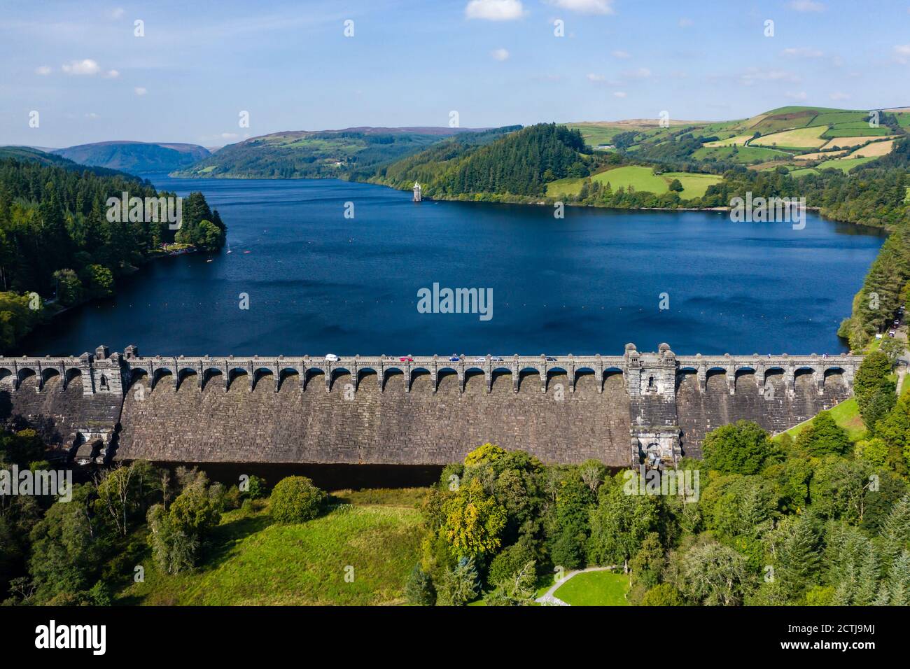 Aerial view of a dam wall and huge reservoir in a rural setting (Lake Vyrnwy, Wales) Stock Photo