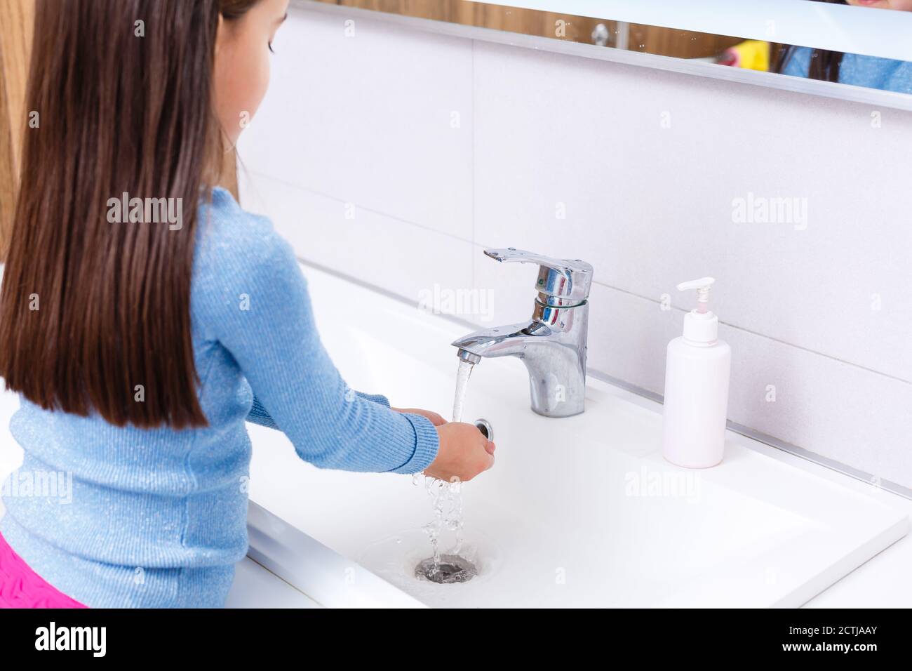 Small child washing hands with soap and water, detail Stock Photo - Alamy