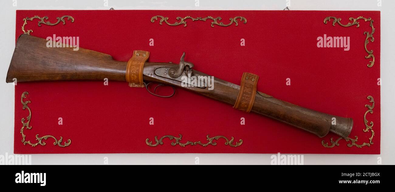 Old Rifle View An old rifle on the wall Stock Photo - Alamy