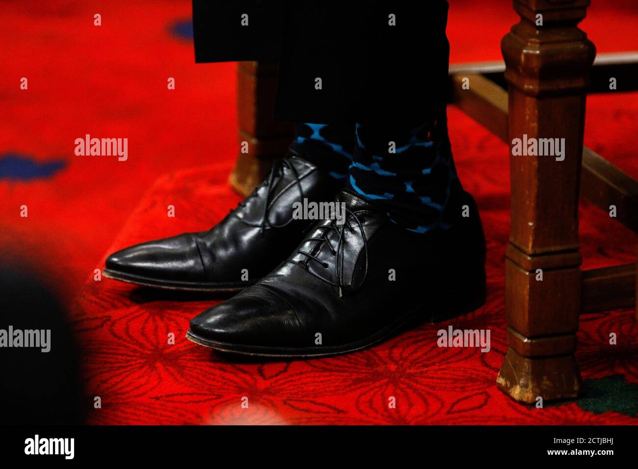 The shoes and socks of Canada's Prime Minister Justin Trudeau are seen  during the Throne Speech in the Senate, as parliament prepares to resume in  Ottawa, Ontario, Canada September 23, 2020. REUTERS/Blair