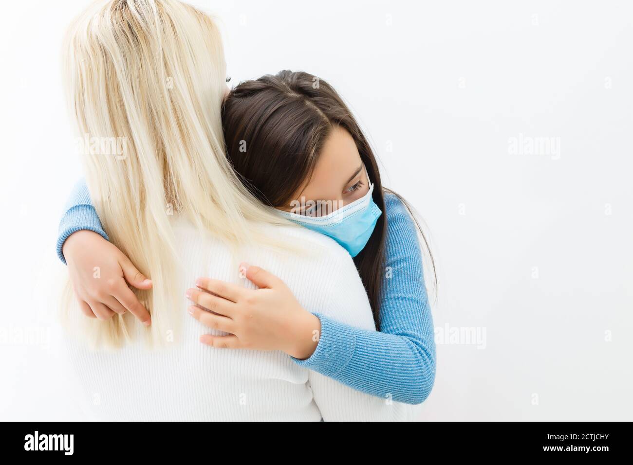 Sick Daughter Wearing Protective Mask Hugging Her Mother Telling About Her Problems Mother Love
