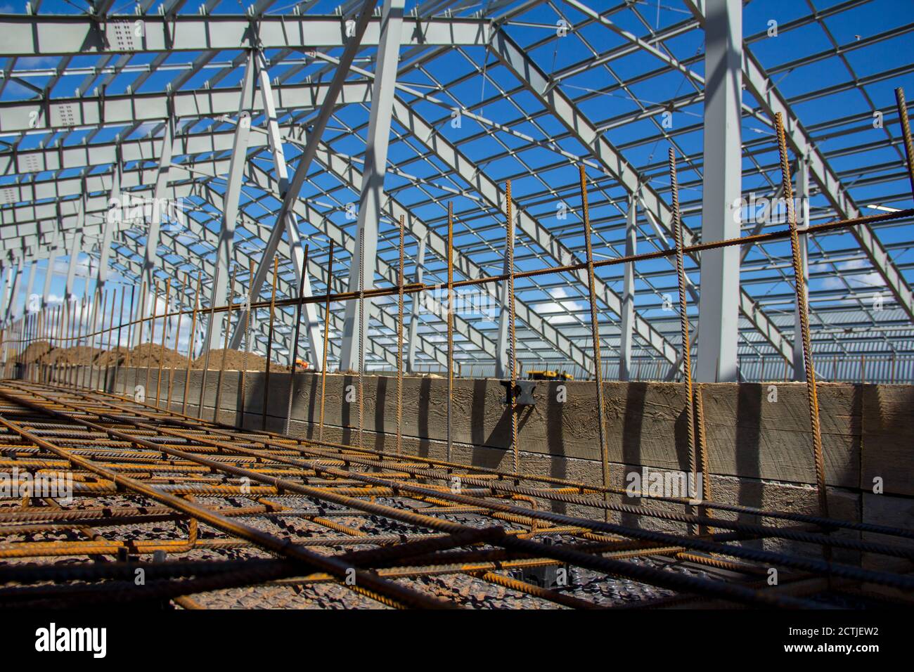 Steel frame of a building under construction. The construction of the ...