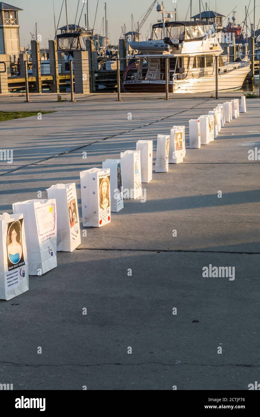 Paper bag luminaries honor cancer survivors at an American Cancer Society Relay for Life event in Gulfport, Mississippi Stock Photo
