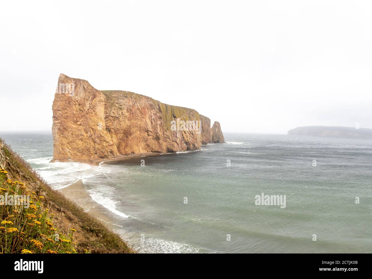Dramatic view of the Percé rock, on the tip of the Gaspé Peninsula in Québec Stock Photo
