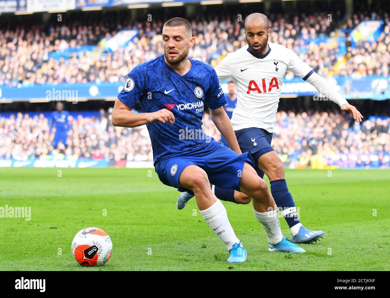 LONDON, ENGLAND - FEBRUARY 22, 2020: Mateo Kovacic of Chelsea and Lucas Moura of Tottenham pictured during the 2019/20 Premier League game between Chelsea FC and Tottenham Hotspur FC at Stamford Bridge. Stock Photo