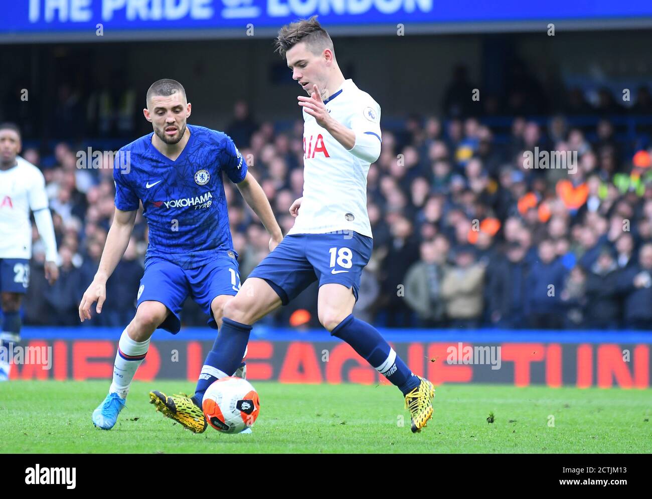 LONDON, ENGLAND - FEBRUARY 22, 2020: Mateo Kovacic of Chelsea and Giovani Lo Celso of Tottenham pictured during the 2019/20 Premier League game between Chelsea FC and Tottenham Hotspur FC at Stamford Bridge. Stock Photo